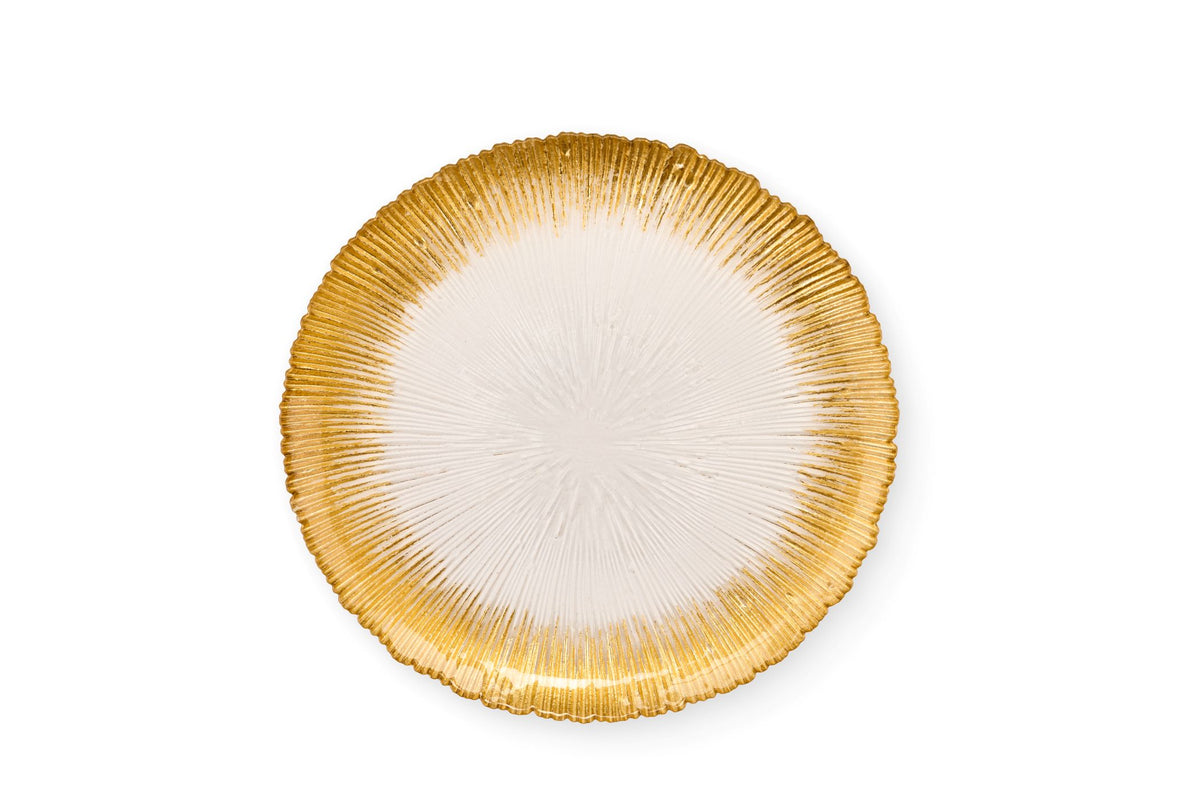 Sottopiatto natalizio in vetro trasparente con fitta lavorazione a raggi e finitura sfumata color oro lucido, diametro 33 cm, collezione Silent Gold Nuvole di Stoffa, Tutto Chic.