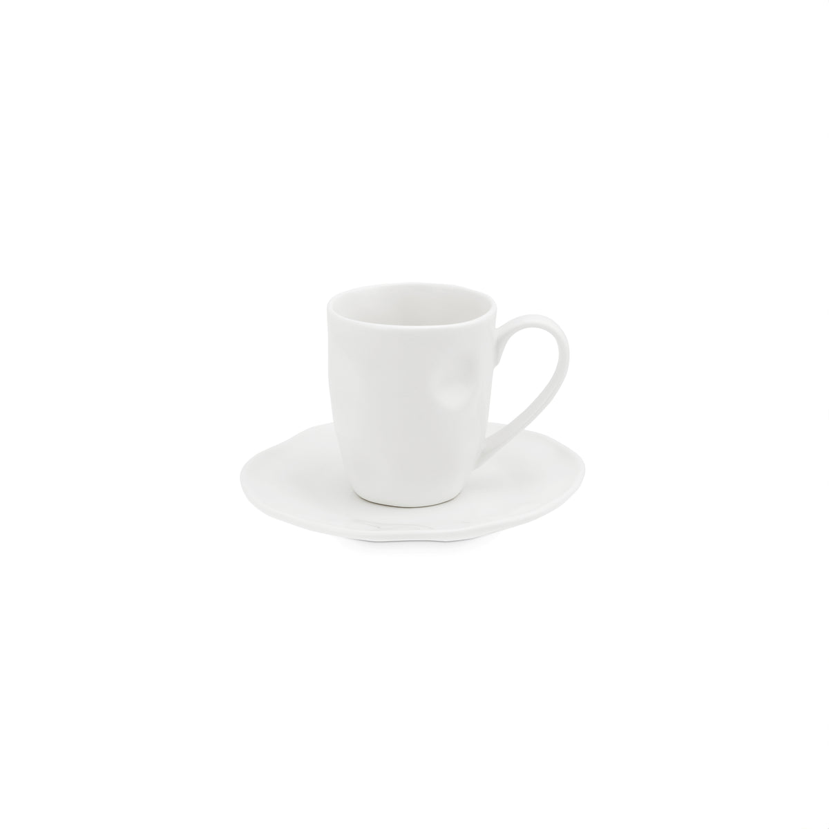 Set di 6 tazzine da caffè con piattino realizzate in porcellana bianca di alta qualità, con una finitura materica. In negozio e online su tuttochic.live