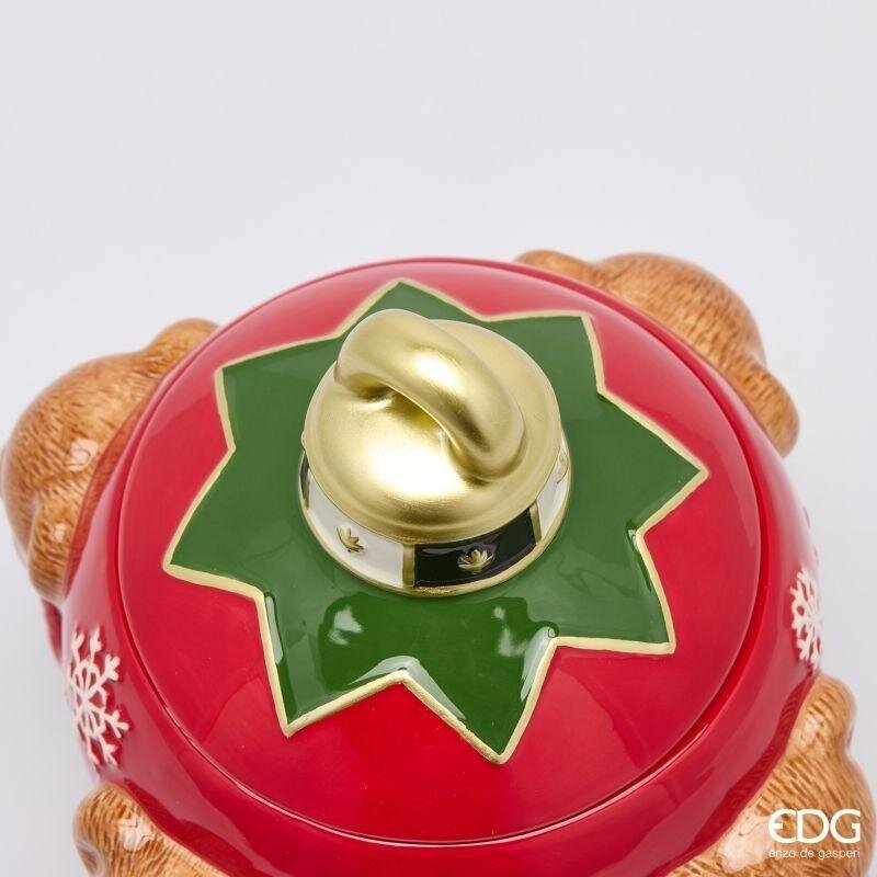 Dettaglio ravvicinato del coperchio in ceramica EDG, caratterizzato da una stella verde smeraldo lucida e da un grande gancio decorativo metallizzato color oro.