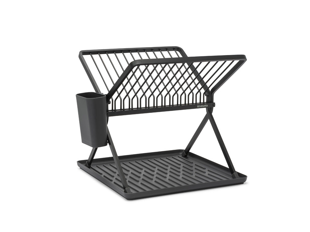 Questo scolapiatti pieghevole di colore grigio scuro è un ottimo supporto per piatti, pentole, padelle e bicchieri. Il portaposate ed il contenitore per utensili cucina sono rimovibili. Dimensioni Altezza: 31,5 cm Lunghezza: 33 cm Larghezza : 36 cm Peso: 1,1 Kg. In negozio e online su tuttochic.live