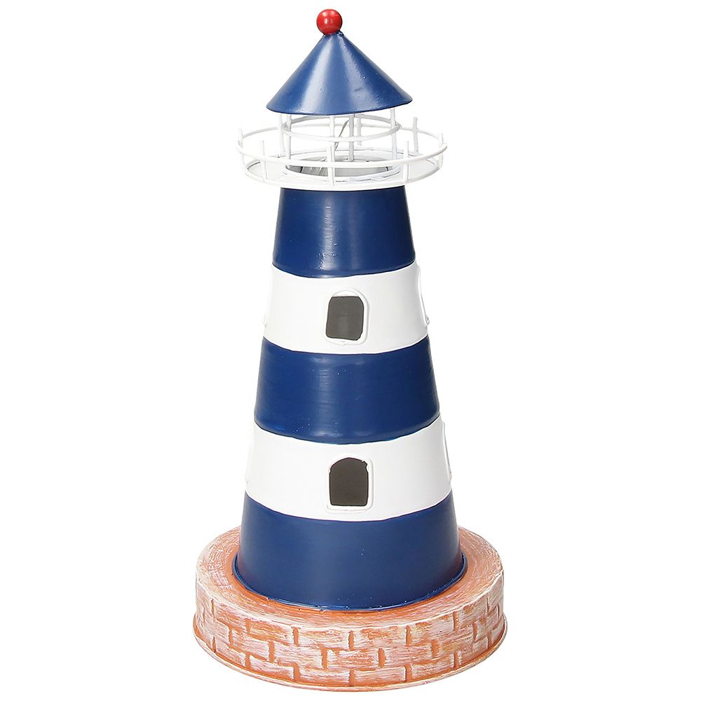Faro marino in metallo colorato. Dimensioni: cm 12,2 x 25 h. In negozio e online su tuttochic.live