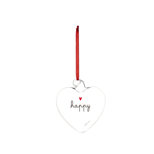 La pallina cuore "happy" è un allegro decoro da appendere, realizzato in vetro borosilicato. In negozio e online su tuttochic.live