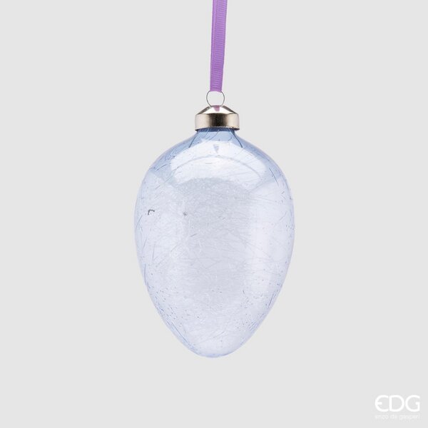 Uovo in vetro da appendere di colore lavanda. Dimensioni: Ø 9,5 x 13,5 h. In negozio e online su tuttochic.live