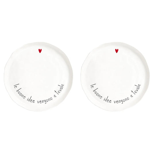 Set di 2 piatti piani in gres porcellanato, resistenti e decorati con una frase divertente. lavabili in lavastoviglie Dimensioni: cm Ø 27 x h 2,5. In negozio e online su tuttochic.live