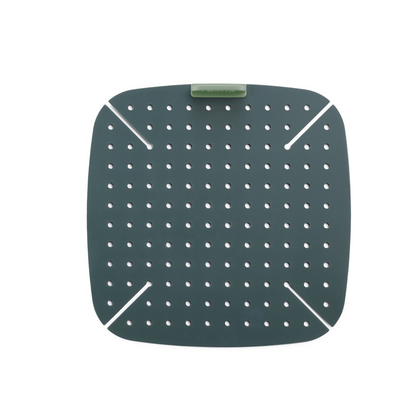 Cuoci il tuo cibo rapidamente e uniformemente grazie a questo tappetino, che ottimizza il flusso di aria calda nella tua friggitrice ad aria. Realizzato in 100% Silicone Platinico. Senza BPA. Lavabile in lavastoviglie - Resiste fino a 220°C Dimensioni: cm 22,5 x 22,5 x h 2,3. In negozio e online su tuttochic.live