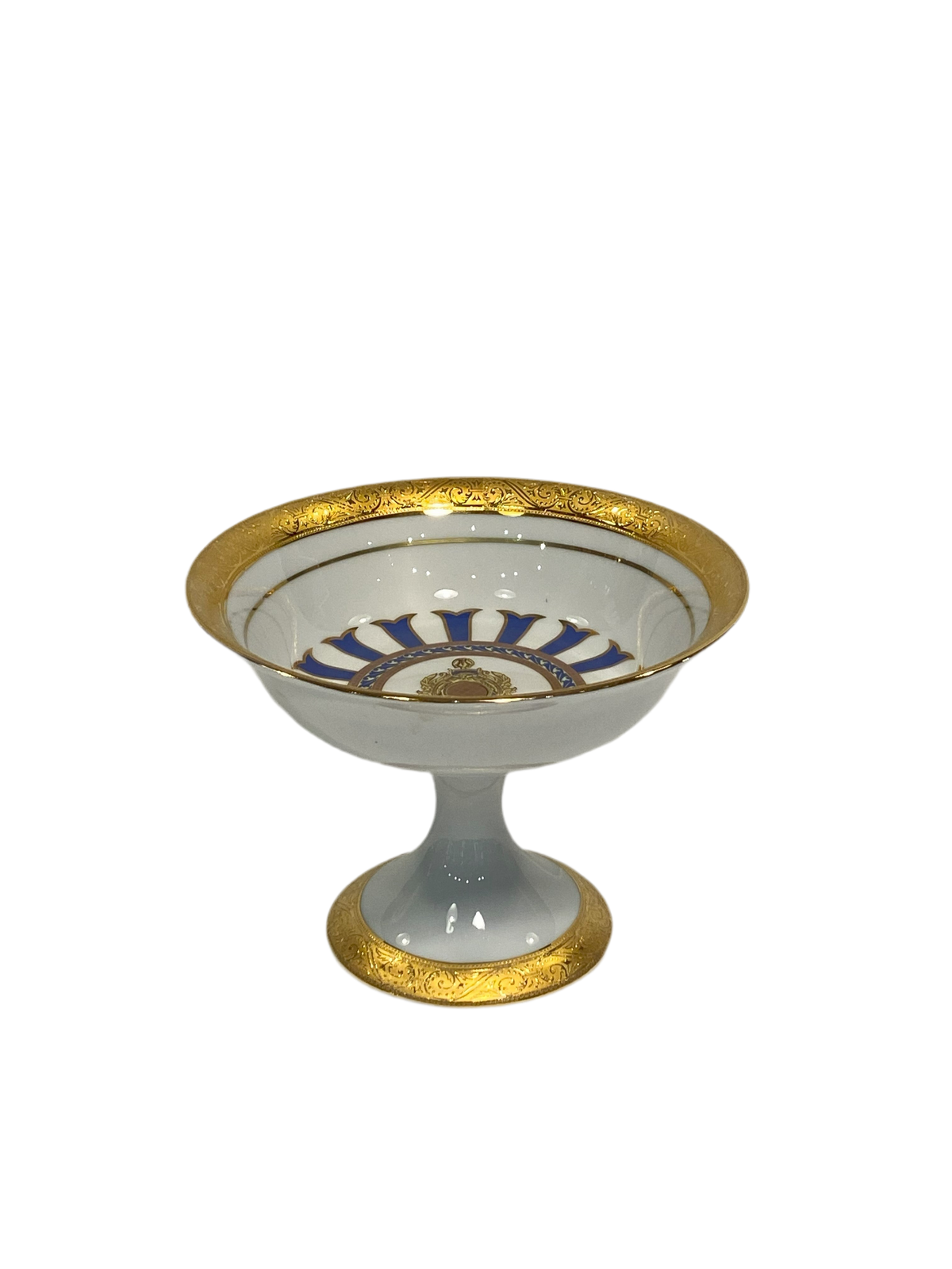 Alzata tonda in porcellana Limoges con decoro in oro zecchino e blu.  Dimensioni: cm ø 18,5 x h 13,5. In negozio e online su tuttochic.live