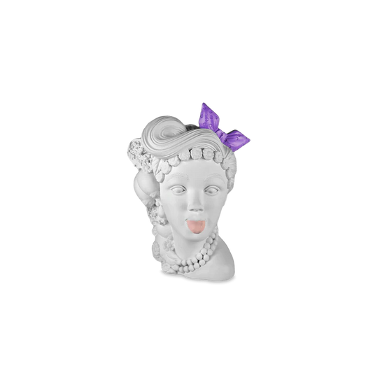 Cameo Decorativo in poliresina della esuberante e iconica collezione Sagrada Familia. Questo cameo può essere poggiato su un mobile o appeso alla parete, L'Irriverente. L’irriverente incarna la personalità di coloro che sfidano le convenzioni e abbracciano la loro individualità... In negozio e online su tuttochic.live
