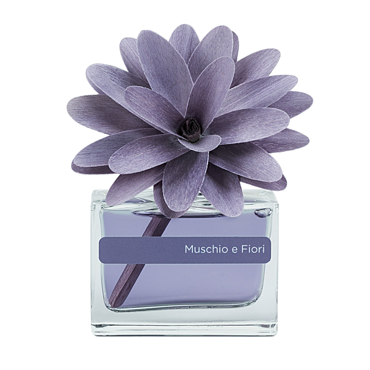 Profumatore d'ambiente con fiore in legno colorato, bottiglia in vetro rettangolare con 30 ml di fragranza. In negozio e online su tuttochic.live