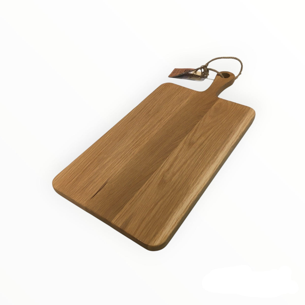 Tagliere rettangolare con manico in legno di quercia. Dimensioni: cm 53 x 26 x 2. In negozio e online su tuttochic.live