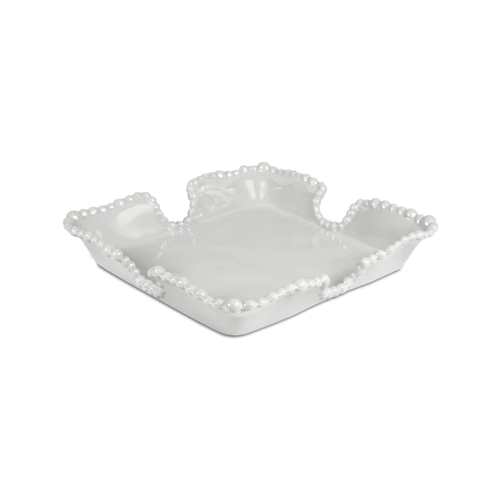 Porta Tovaglioli in melamina dell'innovativa collezione Joke. Tonalità pastello e caratteristico bordo rivestito di micro sfere ornamentali fanno della linea in melamina un ottimo alleato per la tavola.  Dimensioni: 25 x 25 cm ,  H 4 cm. Lavabile in Lavastoviglie. No microonde In negozio e online su tuttochic.live