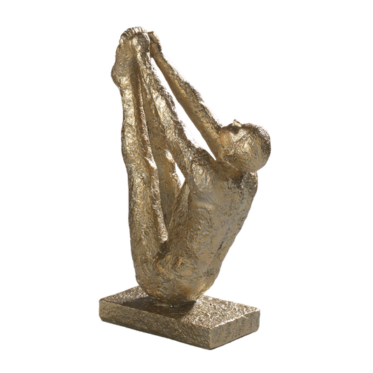 Scultura stampata in resina color oro satinato di uomo che fa yoga. Dimensioni: cm  17,5 x 10 x 29,5  h. In negozio e online su tuttochic.live