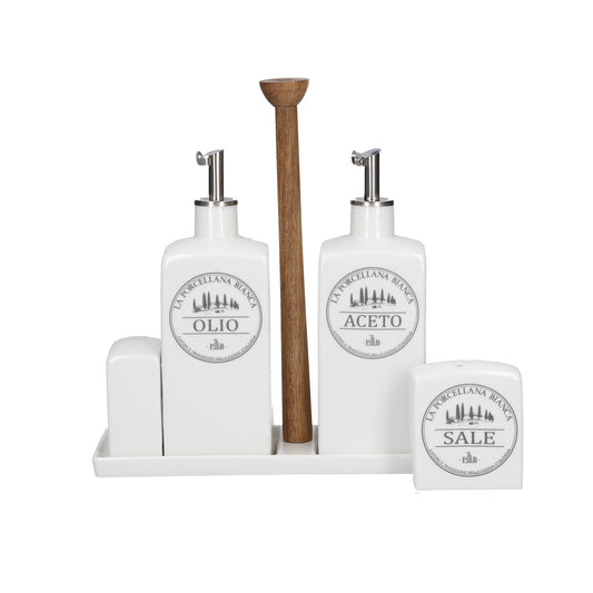 Set olio, aceto, sale e pepe in porcellana bianca con asta centrale in legno. Dimensioni: cm. 22,5x7,5x 22 h. In negozio e online su tuttochic.live