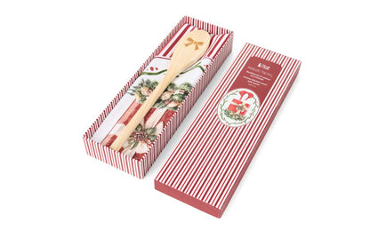 Confezione regalo natalizia aperta Magic Noel Nuvole di Stoffa contenente uno strofinaccio in cotone a righe bianche e rosse e un mestolo in legno con un fiocco inciso sulla punta, Tutto Chic.