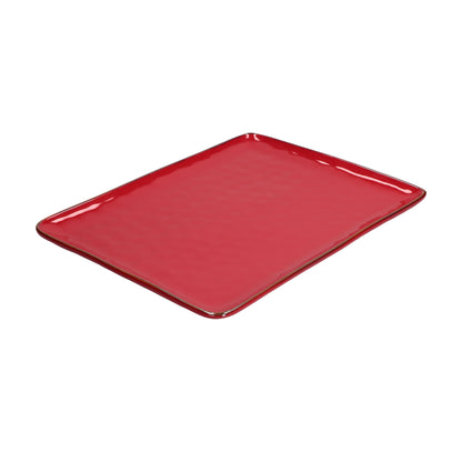 Vassoio rettangolare in porcellana di colore corallo. Colori e forme moderne si mescolano con armonia ed elementi della tradizione. Dimensioni: cm 36 x 26,5 Materiali: Stoneware Lavabile in lavastoviglie. Utilizzabile in microonde. In negozio e online su tuttochic.live