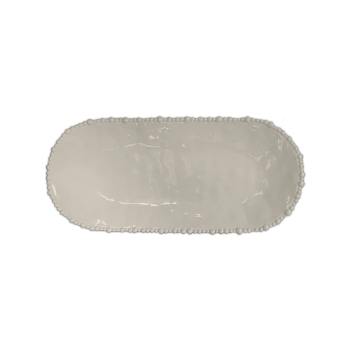 Piatto a Servire ovale in melamina di colore tortora dell'innovativa collezione Joke. Tonalità pastello e caratteristico bordo rivestito di micro sfere ornamentali fanno della linea in melamina un ottimo alleato per la tavola. Dimensioni: 53 x 24 cm. Lavabile in Lavastoviglie. In negozio e online su tuttochic.live