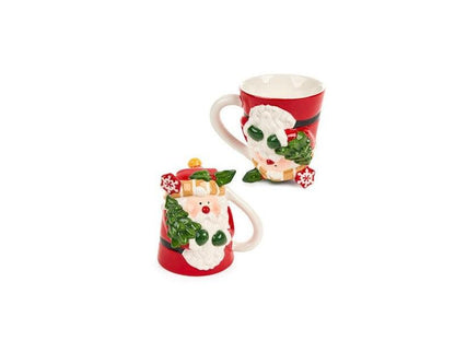 Tazza Babbo Natale della collezione "Cartoline di Natale" di Nuvole di Stoffa. Realizzata in ceramica decorata, questa tazza unica è disponibile in due modelli diversi e poggiata al contrario, si trasforma in un'originale oggetto d'arredo. Capacità 300 ml. In negozio e online su tuttochic.live