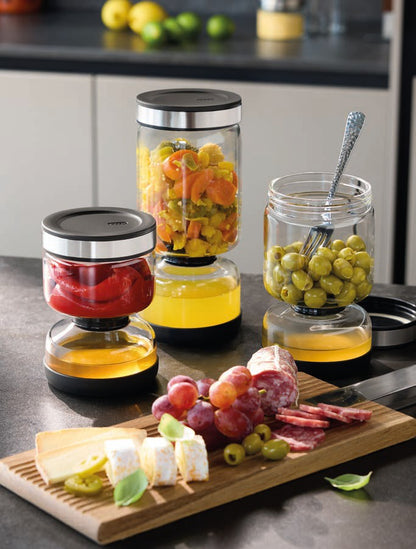 Barattolo scolante LAVINA di GEFU in vetro borosilicato con sistema a doppia camera, disponibile in due misure (900ml e 1300ml).