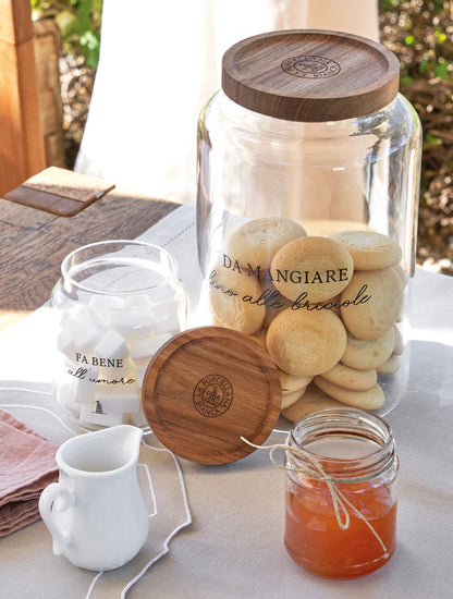 Mieliera in vetro borosilicato trasparente decorato con tappo servimiele ermetico in legno scuro cm ø 9 x h 13 - 400 ml. In negozio e online su tuttochic.live