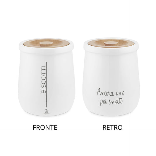 Biscottiera tonda in porcellana bianca decorata con coperchio ermetico in legno chiaro. Dimensioni: cm Ø 16 x h 19 - capacità 2,5 litri. In negozio e online su tuttochic.live