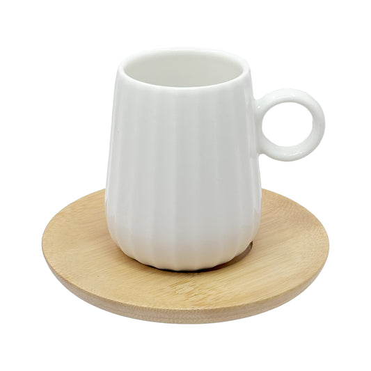 Set di 6 tazzine da caffè INTAVOLA! Realizzate in fine porcellana lavorata con piattino in legno. Capacità: 90 ml Dimensioni: cm Ø 10 x h 8. In negozio e online su tuttochic.live