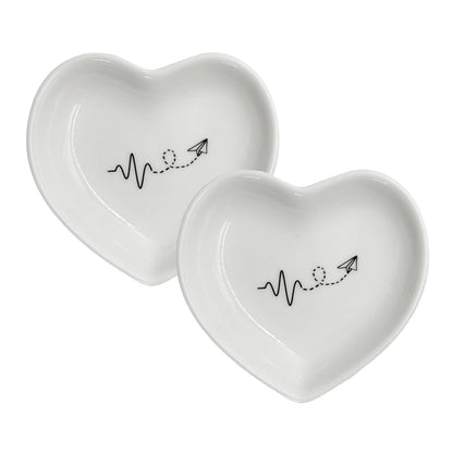 2 ciotoline a forma di cuore per alimenti in porcellana bianca decorata. Dimensioni singolo pezzo: cm 7,5 x 7,5 x h 1,5. In negozio e online su tuttochic.live