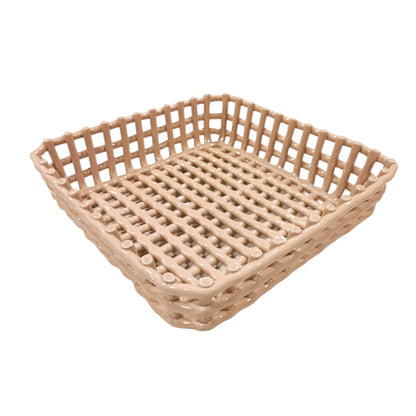 Centrotavola in porcellana fatto a mano di colore nocciola. "Collezione Catturata" di Rituali domestici Dimensioni: 21 x 21 x 8  h cm. In negozio e online su tuttochic.live