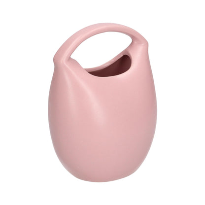 Vaso a forma di borsa in gres dai colori pastello che si abbinano facilmente ad ogni ambiente. I l social trend della borsetta ispira queste collezioni, che vogliono essere un omaggio alla moda sfiziosa e disimpegnata che entra in casa a portare leggerezza. cm  13.5 x 10 x 18 h. In negozio e online su tuttochic.live