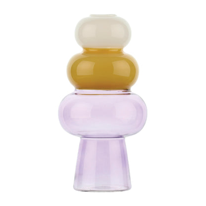 Vaso monofiore in vetro borosilicato. Più che vasi, sembrano piccole sculture in vetro dal design originale e contemporaneo, che regalano a ogni stanza personalità e luce. Alchimia è un omaggio retrò agli alambicchi. Dimensioni: cm Ø 11 x 22 h. In negozio e online su tuttochic.live