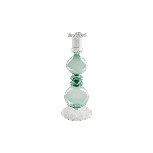 Portacandela "Allacorte". Realizzato in vetro borosilicato con tonalità di colore verde. Dimensioni: Ø 9 x 24,5 h cm. In negozio e online su tuttochic.live 