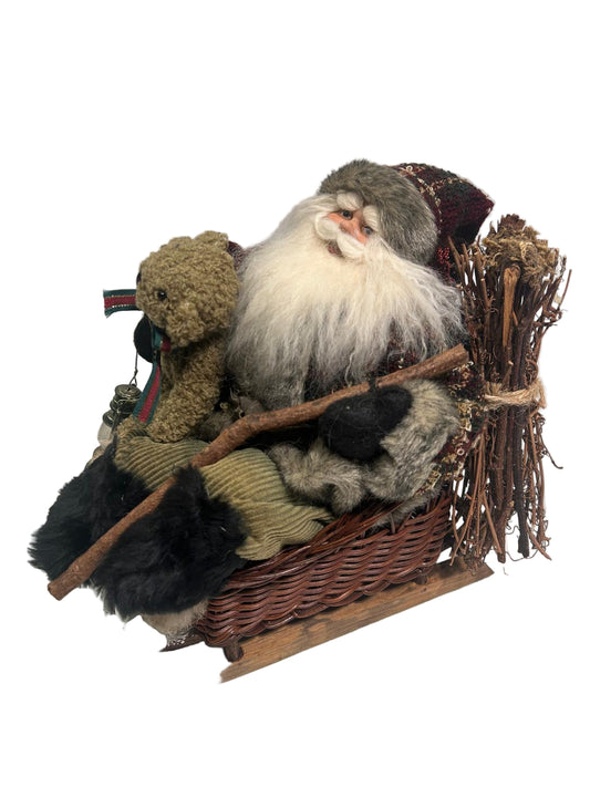 Babbo Natale su slitta con orsacchiotto e lanterna