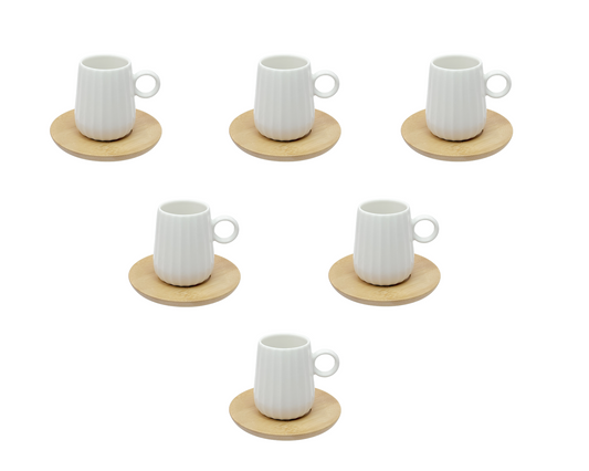Set di 6 tazzine da caffè INTAVOLA! Realizzate in fine porcellana lavorata con piattino in legno. Capacità: 90 ml Dimensioni: cm Ø 10 x h 8. In negozio e online su tuttochic.live