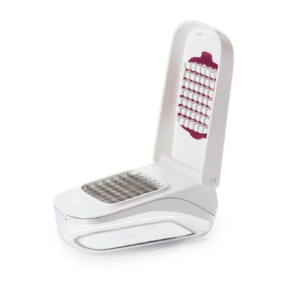 Taglia verdure, frutta e molto altro ancora in parti uguali con un solo movimento facile e rapido. I pezzi uniformi vengono raccolti nel contenitore sottostante.• Materiale: acciaio inox e plastica BPA free• Lavabile in lavastoviglie• Dimensioni: 20 x 12,5 x 9 cm. In negozio e online su tuttochic.live