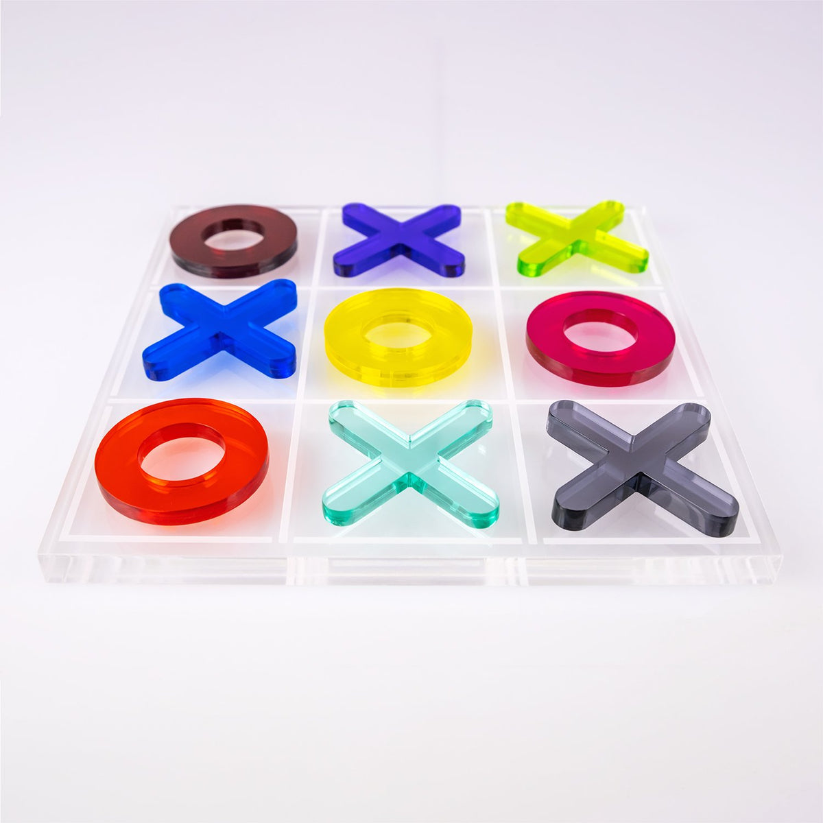 Set del gioco da tavolo del tris, interamente in cristallo acrilico. Dimensioni: cm 20 x 20 x h 12 mm. In negozio e online su tuttochic.live