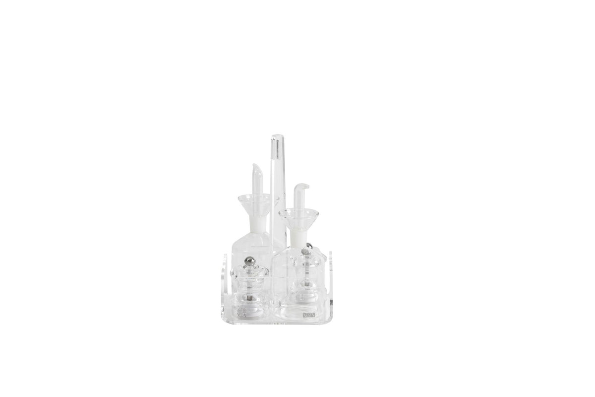 Il menage Like Water nasce per completare una tavola moderna e minimal. La trasparenza delle bottiglie salvagoccia in vetro e del cristallo acrilico della struttura lo rendono un perfetto complemento della tavola discreto e raffinato. Dimensioni cm 14,5x14x5x23 h. Spessore PMMA mm 4. In negozio e online su tuttochic.live