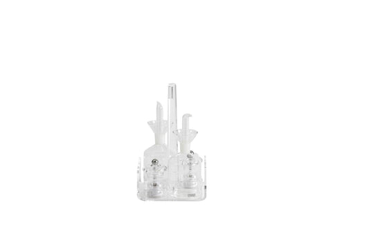 Il menage Like Water nasce per completare una tavola moderna e minimal. La trasparenza delle bottiglie salvagoccia in vetro e del cristallo acrilico della struttura lo rendono un perfetto complemento della tavola discreto e raffinato. Dimensioni cm 14,5x14x5x23 h. Spessore PMMA mm 4. In negozio e online su tuttochic.live