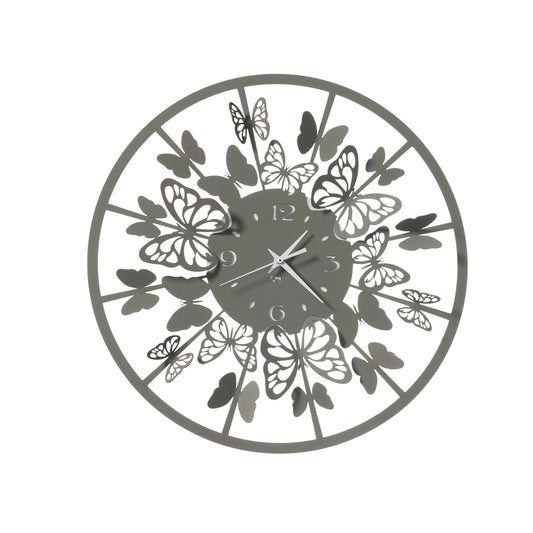 Orologio da parete Sfarfallio piccolo in metallo di colore fango è un complemento d’arredo ispirato alla natura, in particolar modo alle farfalle. Questo orologio è perfetto in camera da letto, ma anche in ufficio e nelle varie zone della casa. Dimensioni: Ø 41 cm. In negozio e online su tuttochic.live