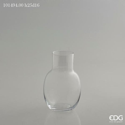 Vaso bombato in vetro trasparente con collo. Dimensioni: cm h 25 x ø 16 ( bocca collo ø 8 cm). In negozio e online su tuttochic.live