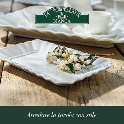Vassoio rettangolare da portata in porcellana bianca lavorata cm. 35 x 26.Utilizzabile in forno tradizionale, microonde e lavastoviglie. Lavabile in lavastoviglie. Utilizzabile in microonde. In negozio e online su tuttochic.live