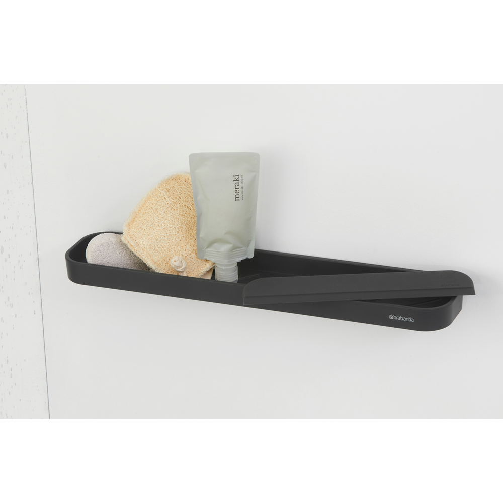 Mensola portaoggetti per doccia con tergivetro MindSet grigio scuro di Brabantia. Il portaoggetti può contenere shampoo, gel ecc.. Il tergivetro è fatto per pulire senza sforzo la porta della doccia e le piastrelle. Peso0.4 kg Altezza: 7,3 cm Lunghezza: 9 cm Larghezza : 42,1 cm. In negozio e online su tuttochic.live
