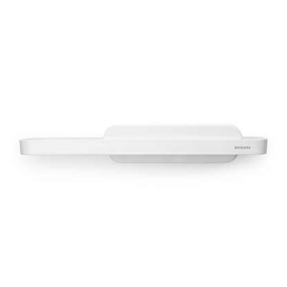 Mensola portaoggetti per doccia con tergivetro MindSet bianco di Brabantia. Il portaoggetti può contenere shampoo, gel ecc.. Il tergivetro è fatto per pulire senza sforzo la porta della doccia e le piastrelle. Peso0.4 kg Altezza: 7,3 cm Lunghezza: 9 cm Larghezza : 42,1 cm. In negozio e online su tuttochic.live