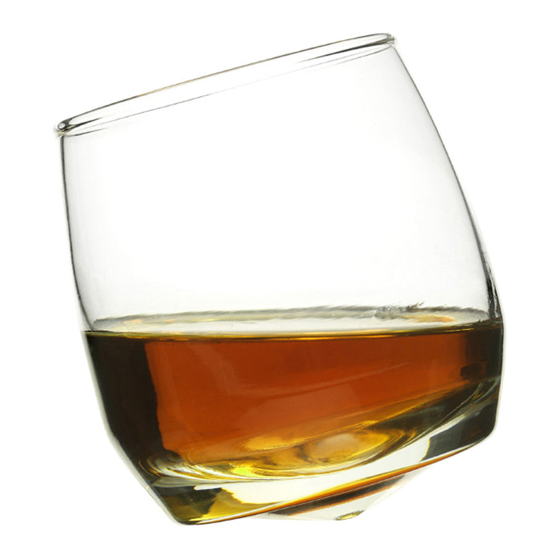 Set di 6 bicchieri in vetro basculanti ideali per whisky, rum e distillati di ogni tipo. Dimensioni cm 8 x 8 x 9 h ; Cl 20. In negozio e online su tuttochic.live