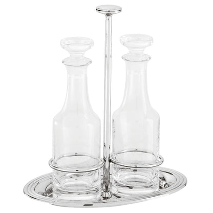 Servizio oliera e acetiera in acciaio argentato e cristallo della collezione Elite di Sambonet. Provvedere ad una lucidatura con l’ausilio di specifici prodotti per l'argento. Dimensioni: Altezza: 21,7 cm larghezza: 12,80 cm, lunghezza: 19.20 cm Peso dell'articolo: 920 gr. In negozio e online su tuttochic.live