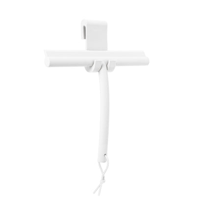 Tergivetro per doccia in silicone bianco con gancio di supporto collezione VIPO di Blomus.
