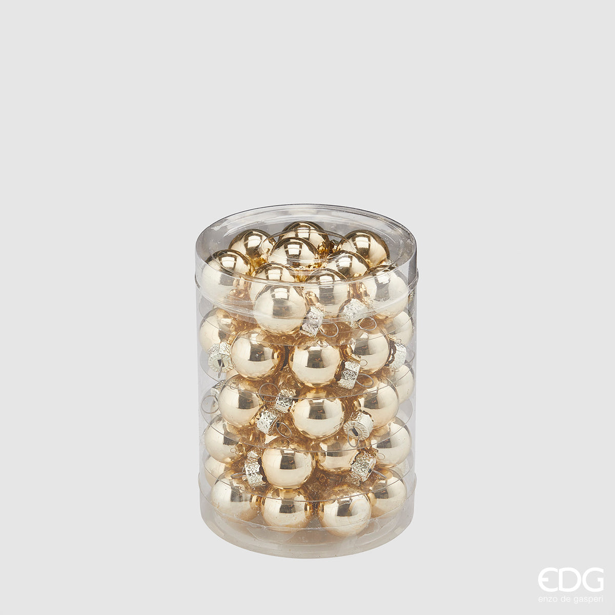 Confezione cilindrica trasparente contenente 50 mini palline di Natale in vetro soffiato color oro lucido specchiato, diametro 2 cm, firmate EDG Enzo De Gasperi.