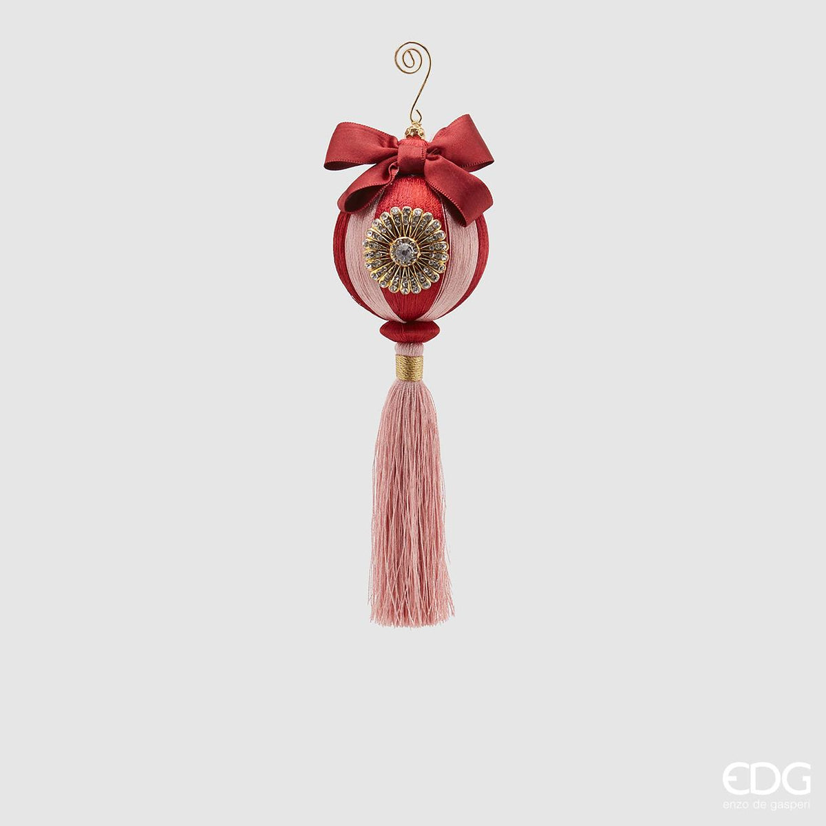 Decoro palla in tessuto decorato a spicchi rosa e rosso con spilla e nappa. Dimensioni: ø 8, h 23. In negozio e online su tuttochic.live