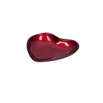 Piattino in vetro di colore rosso a forma di cuore. Dimensioni: Ø 14 cm. In negozio e online su tuttochic.live