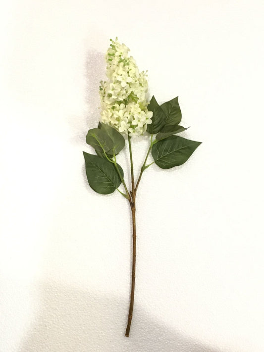 Fiore artificiale Lillà Eden di colore bianco. Dimensioni: cm 52. Petali e foglie in tessuto, rametti in plastica. In negozio e online su tuttochic.live
