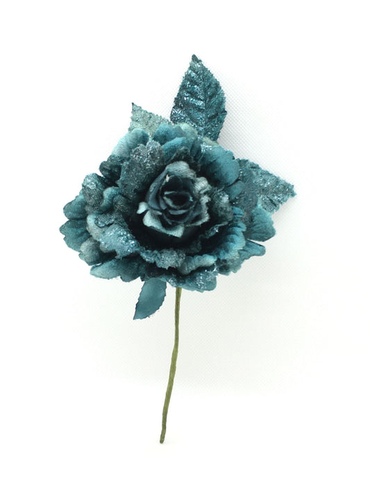 Rosa artificiale in tessuto di colore turchese con glitter. Dimensioni: cm 10 x 18 h. In negozio e online su tuttochic.live