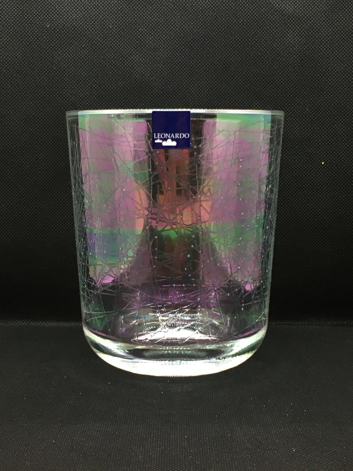 Vaso portacandela in vetro con decoro iridescente. Dimensioni: ø cm 11,5 x 13,5 h , spessore vetro cm 1. In negozio e online su tuttochic.live