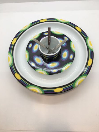Ciotola per olive o cubetti di formaggio (aperitivi) o come oggetto decorativo, anche come porta candela (t-light), in porcellana decorata da Shinobu Ito nel 2004,&nbsp;Edizione Limitata, della collezione "Athena" di Ritzenhoff. Dimensioni: Ø cm 18,5x 3,5 h.  In negozio e online su tuttochic.live